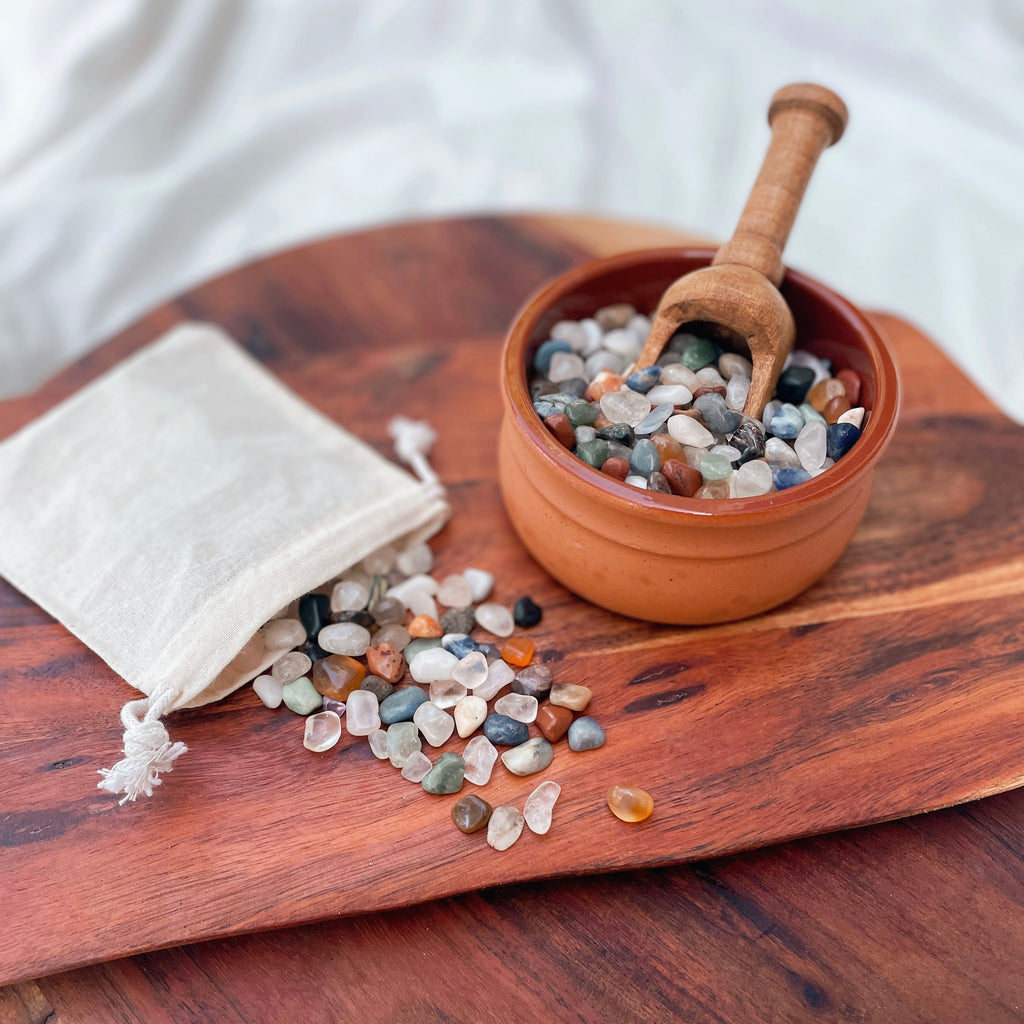 Small tumbled stones and crystal chips. Perfect addition to your NZ made play dough, sure to inspire a little sparkle in your child's sensory play. Part of our loose parts collection